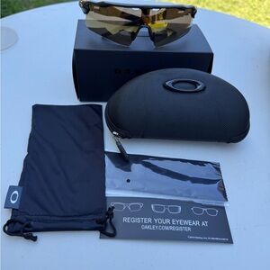 Oakley Sunglasses with Black Frame and Case